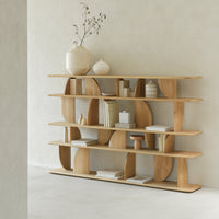 Light wood shelving unit with a contemporary, curved design, featuring natural tones and smooth surfaces.