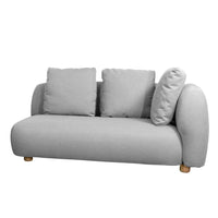 Light gray sofa with rounded shapes and three plush cushions, accented by a wooden base. Minimalistic and modern design.