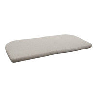 Light gray, textured mattress pad with a smooth, rounded edge and subtle pattern for modern decor.