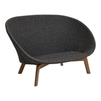 Gray woven pattern chair with smooth curves and natural wood legs, perfect for modern decor.