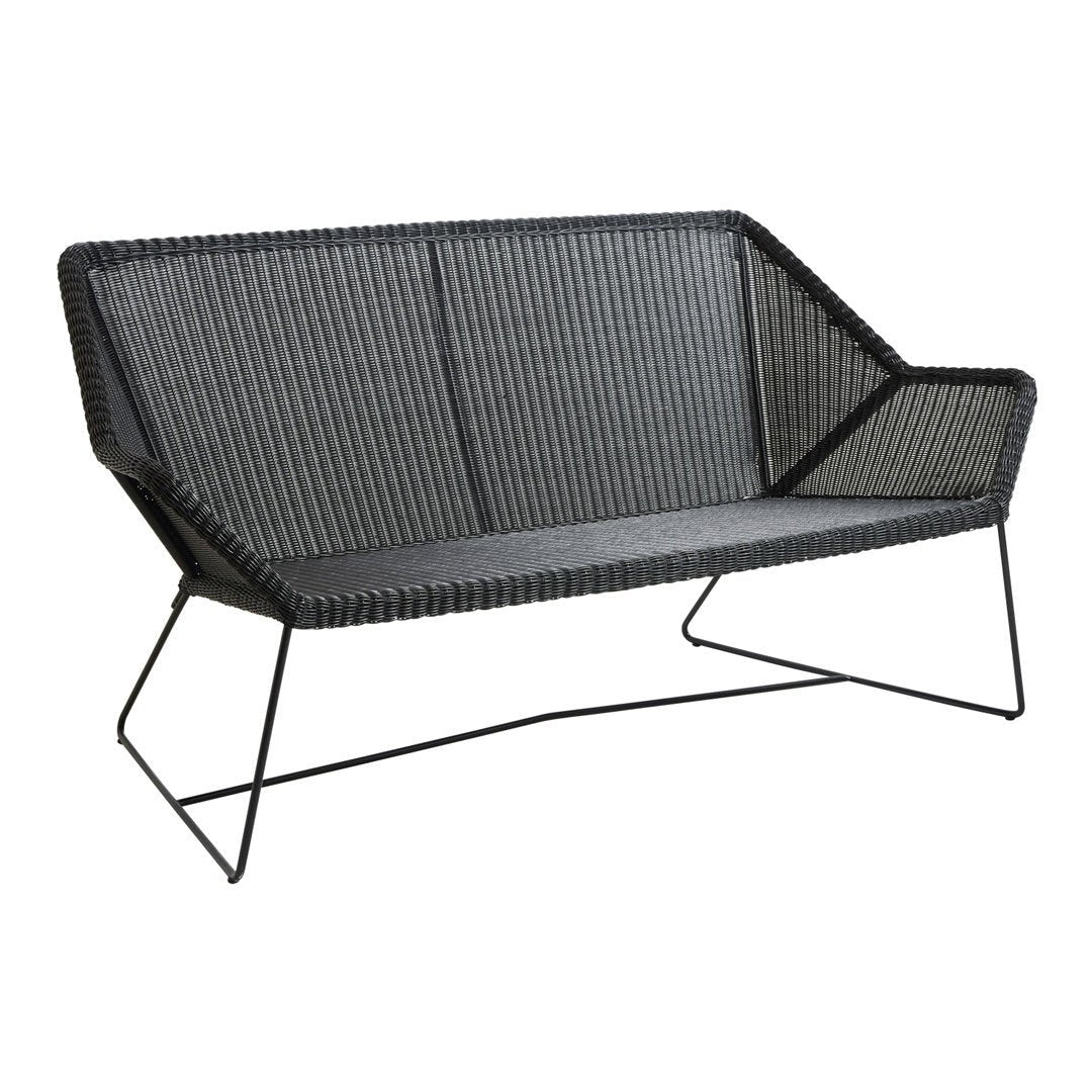 Stylish black woven loveseat with a modern geometric design and sleek metal legs, perfect for contemporary decor.