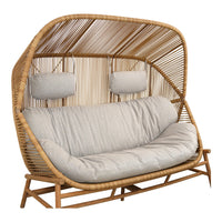 Stylish rattan sofa with a natural bamboo frame and soft gray cushions, featuring a modern, airy design.