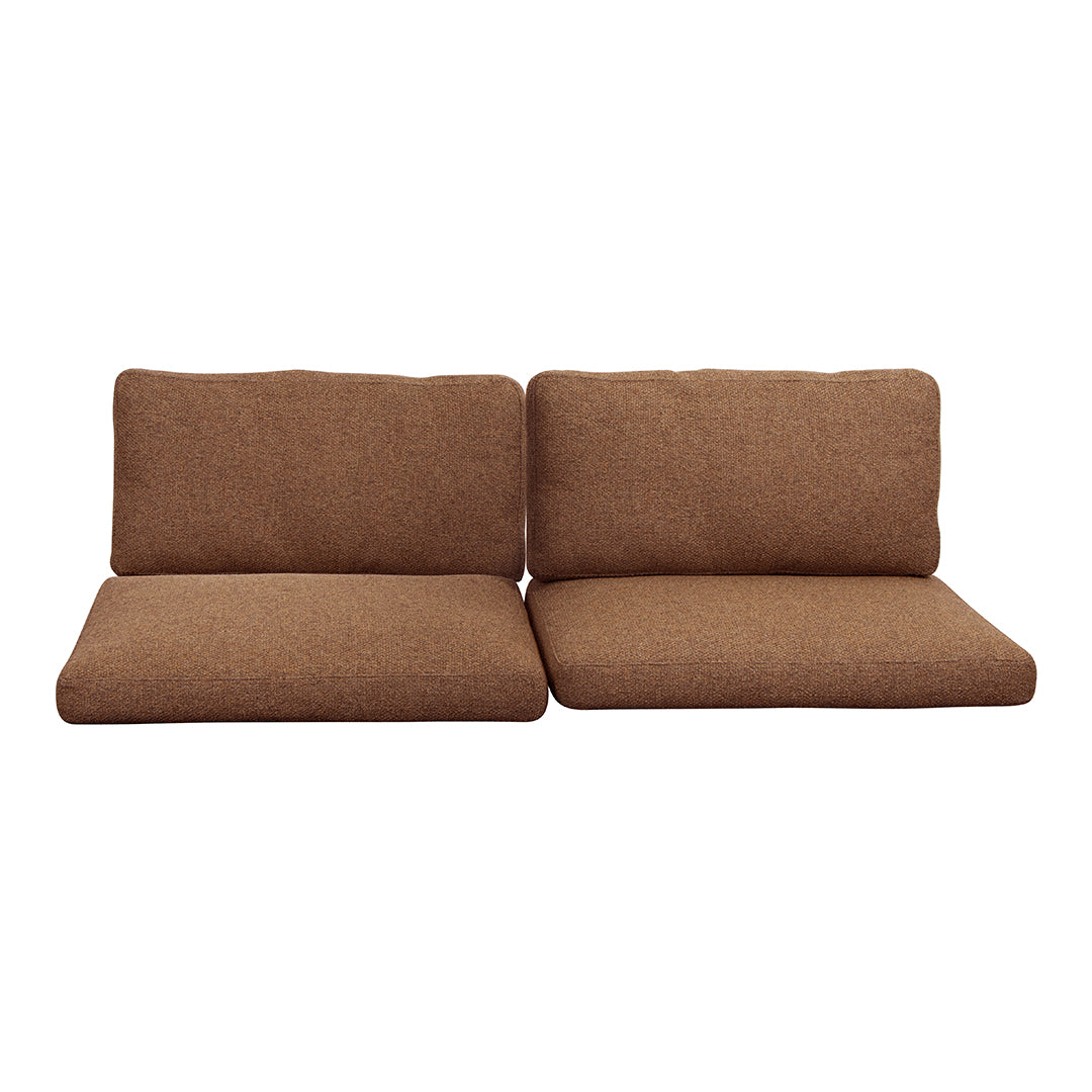 Brown textured fabric sofa cushions with a clean, minimalistic design, perfect for modern decor.