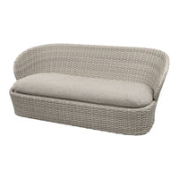 Beige woven sofa with a soft, taupe cushion, featuring a minimalist, contemporary design. Ideal for modern decor.