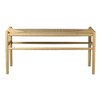 Natural wood bench with a light beige woven seat pattern, featuring a minimalist design and clean lines.