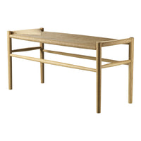 Natural wood finish bench with woven light tan seat, minimalist design and clean lines, perfect for modern interiors.