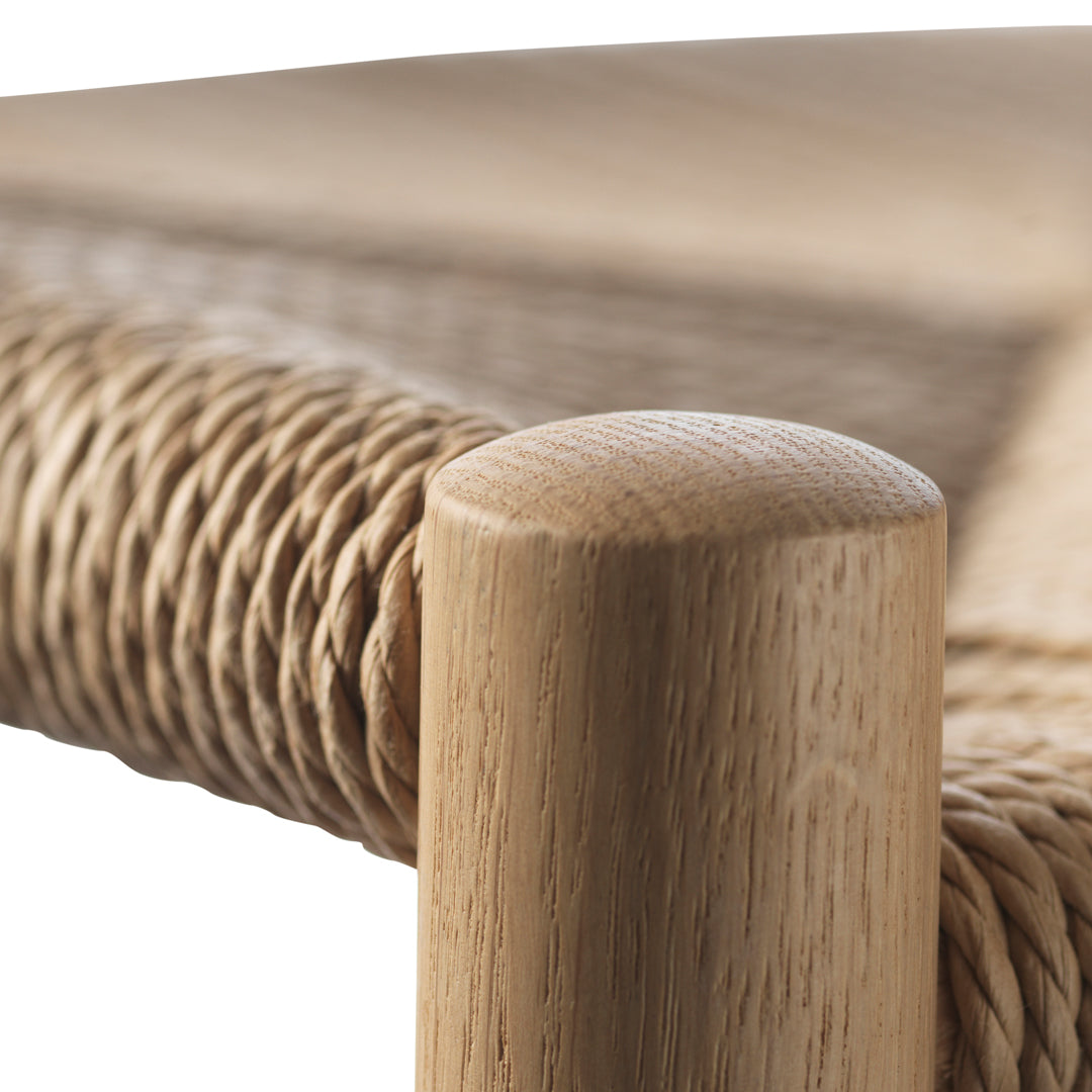 Natural wood finish with a textured beige woven pattern, highlighting earthy tones and organic design.