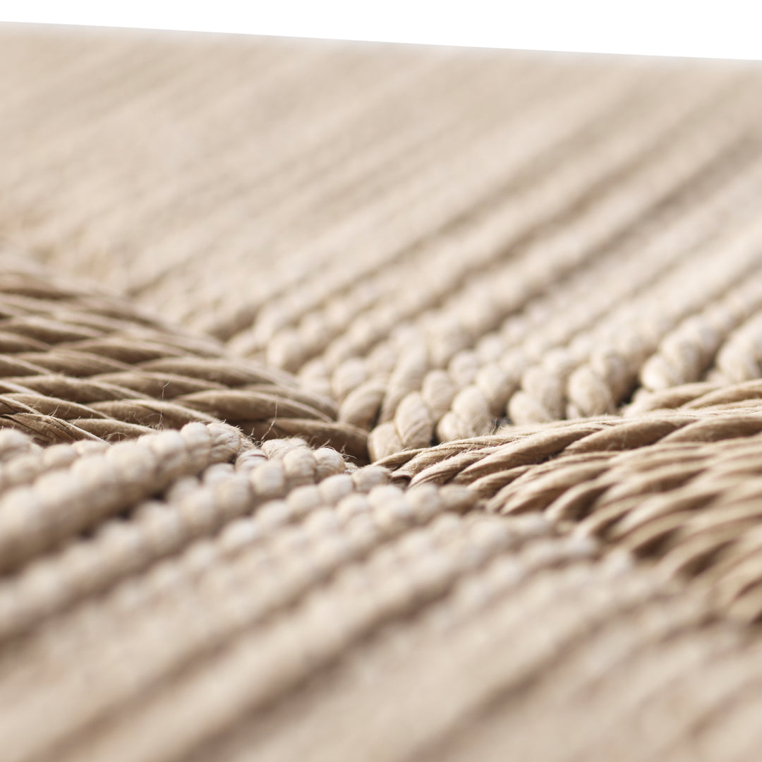 Natural beige woven texture with intricate patterns and soft, earthy tones, perfect for a cozy aesthetic.