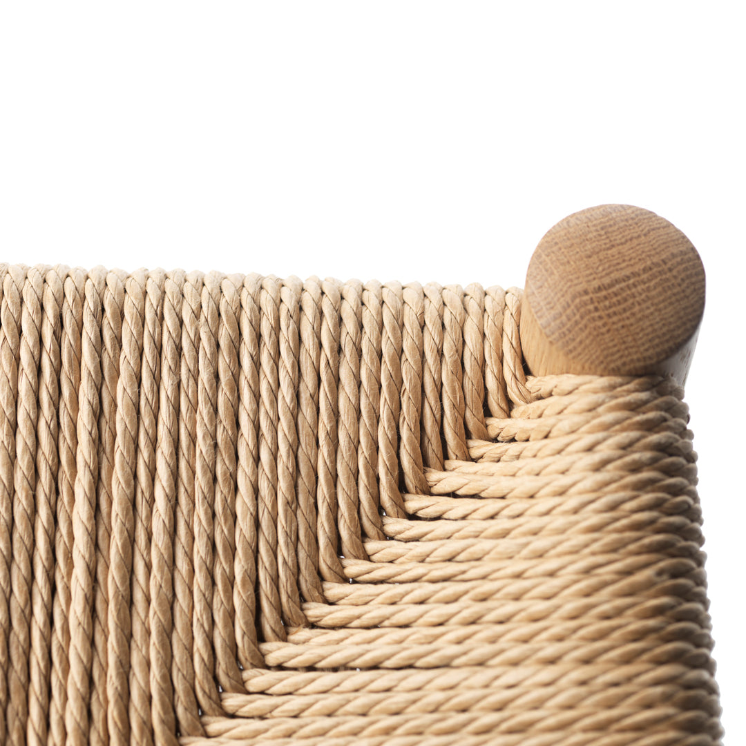 Natural beige woven rope pattern with light wood accents, showcasing textured craftsmanship and modern design.