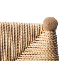 Natural beige woven rope pattern with light wood accents, showcasing textured craftsmanship and modern design.