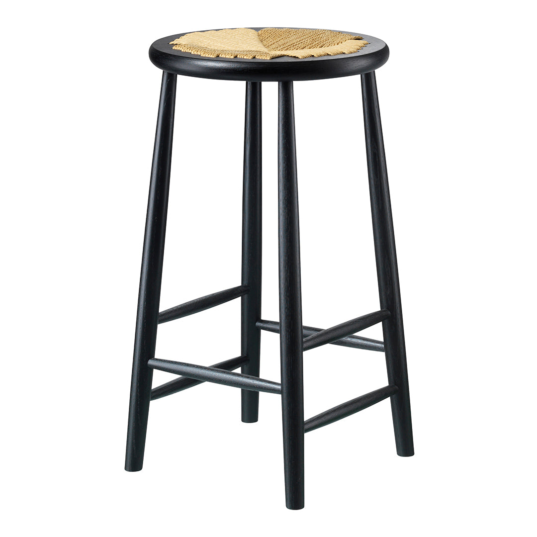 Black wooden stool with a natural woven seat featuring a two-tone design. Sleek and modern for any decor.