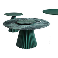 Green marble tabletop with a fluted base, featuring dark green and black veining patterns. Contemporary design.
