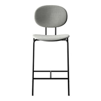 Gray upholstered bar stool with a minimalist design and black metal frame. Ideal for modern interiors.