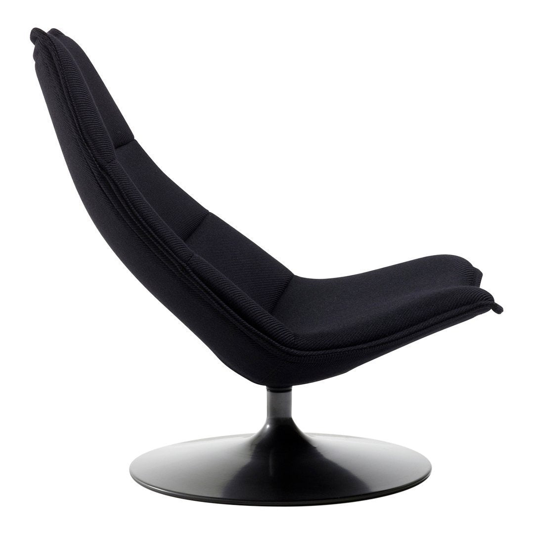Black upholstered chair with smooth, modern lines and a sleek, circular black base. Ideal for contemporary decor.