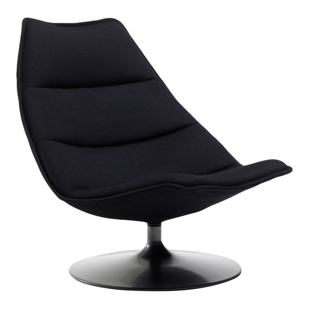 Sleek black lounge chair with a smooth, curved design and subtle, textured fabric. Perfect for modern decor.