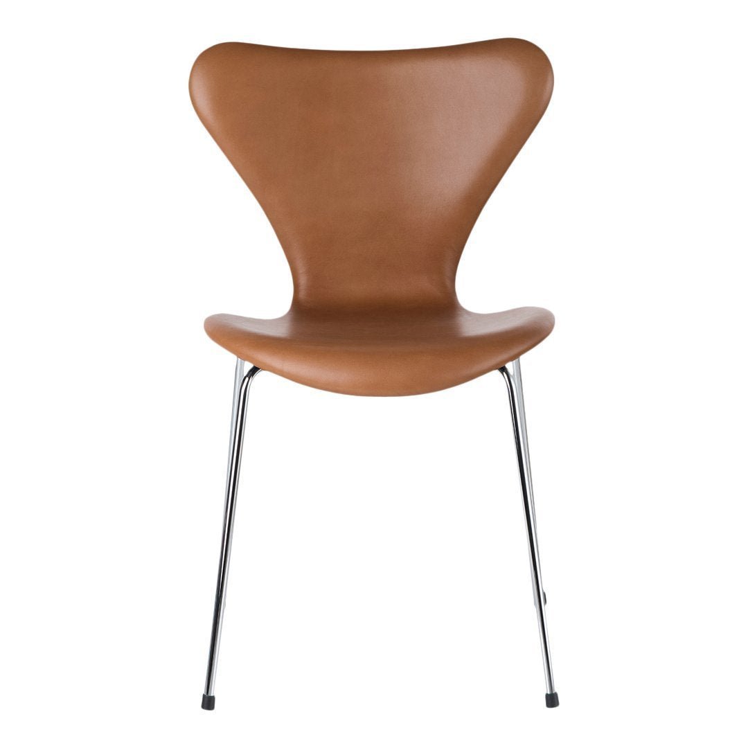 Brown leather chair with a smooth, modern design and sleek chrome legs, perfect for contemporary decor.