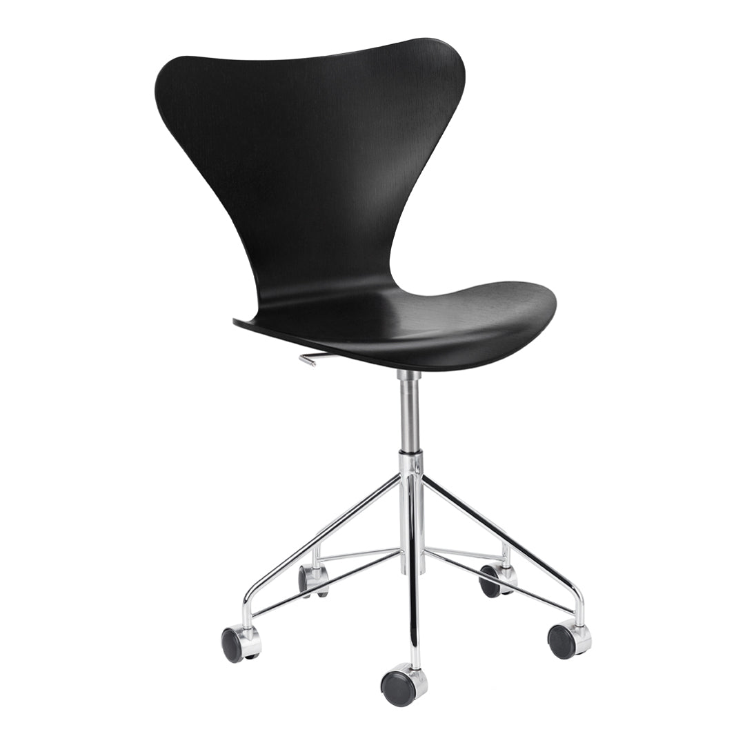 Black modern swivel chair with a sleek curved design and chrome base, featuring smooth, minimalist lines.
