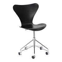 Black modern swivel chair with a sleek curved design and chrome base, featuring smooth, minimalist lines.