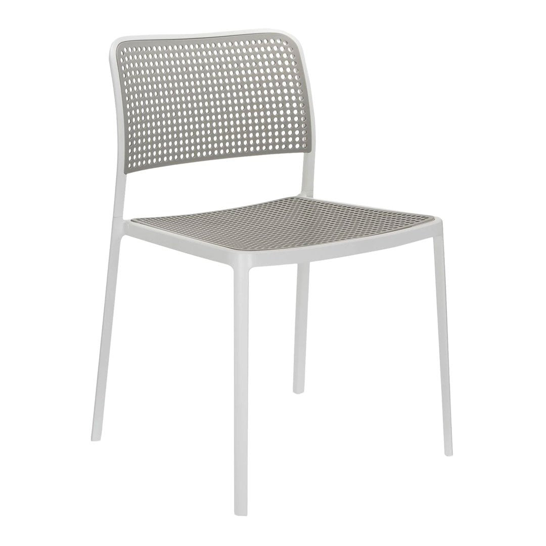 Gray perforated dining chair with a sleek, modern design and minimalist aesthetics. Perfect for contemporary settings.