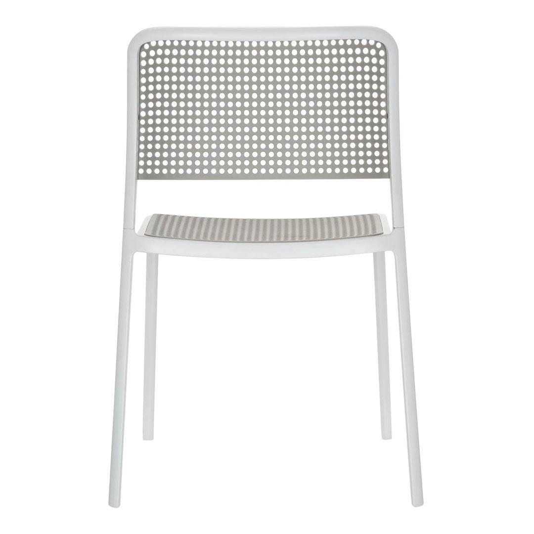 White chair with a woven rattan pattern in gray accents, featuring a minimalist design and clean lines.