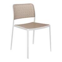 Modern white chair with a tan woven pattern and open-back design, perfect for contemporary interiors.