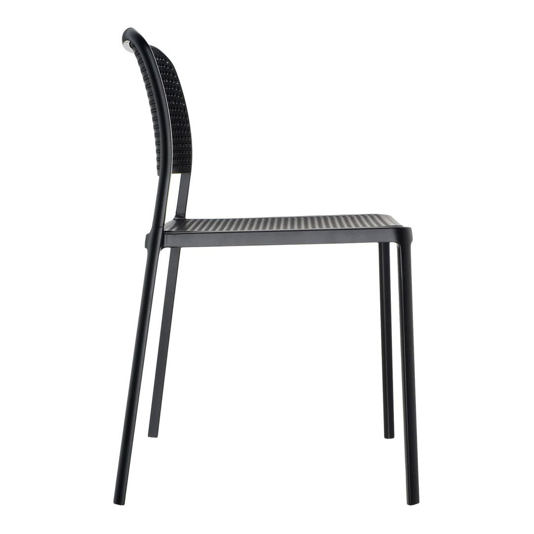 Black woven chair with a modern minimalist design and textured pattern, perfect for contemporary decor.