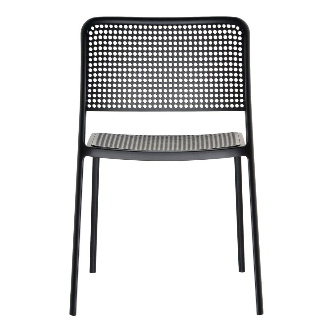 Black chair with a perforated backrest and striped seat pattern, ideal for modern decor.