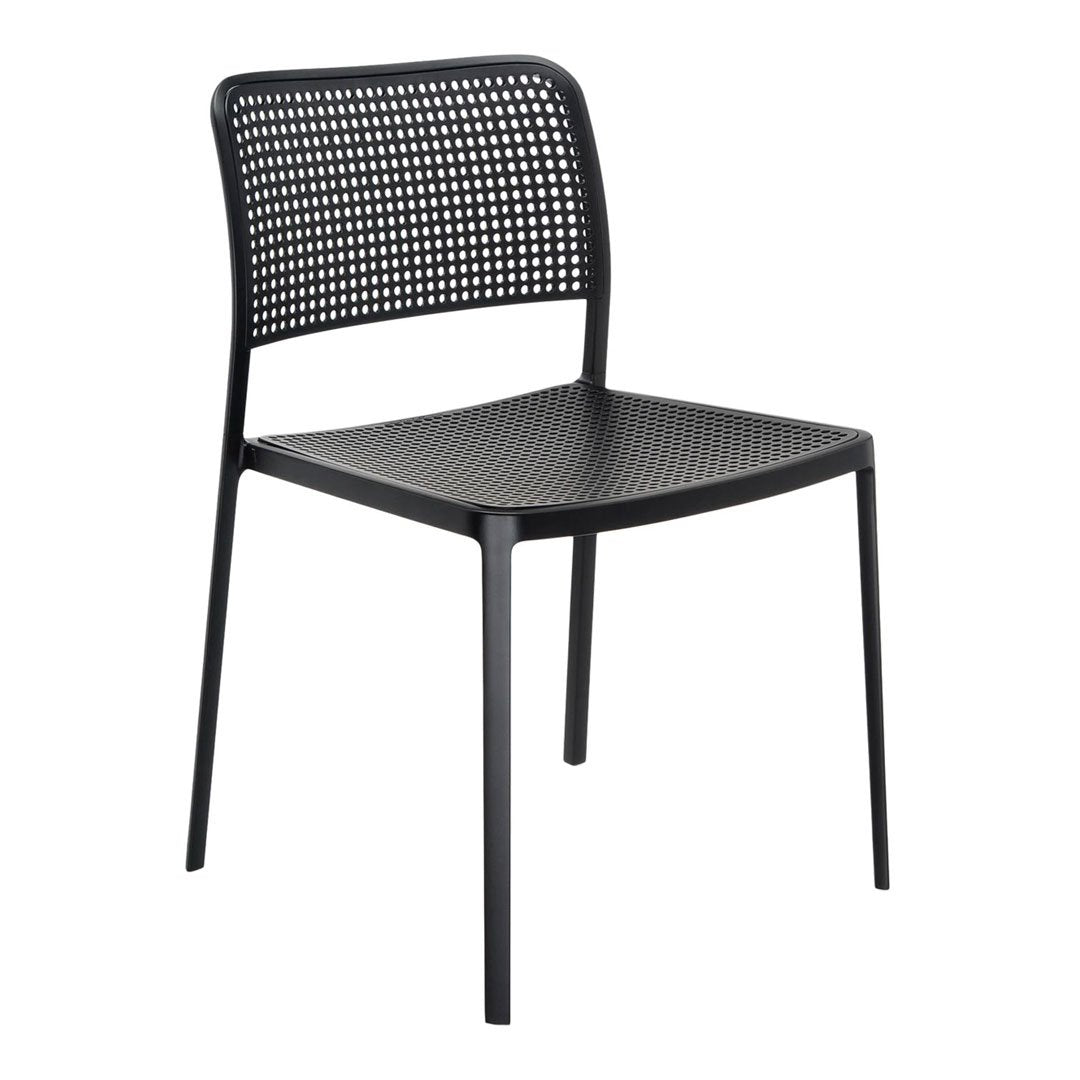 Black perforated dining chair with a sleek, minimalist design and modern aesthetic. Perfect for contemporary decor.