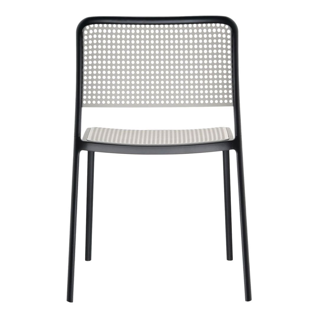 Black and white chair featuring a sleek, grid-patterned backrest and a striped seat for modern decor.