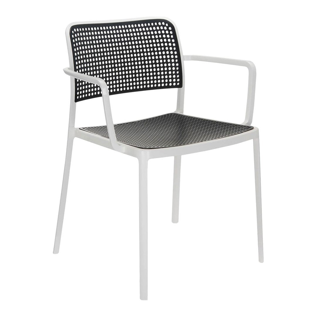 Black and white perforated chair with a sleek design and minimalist appeal, perfect for modern decor.