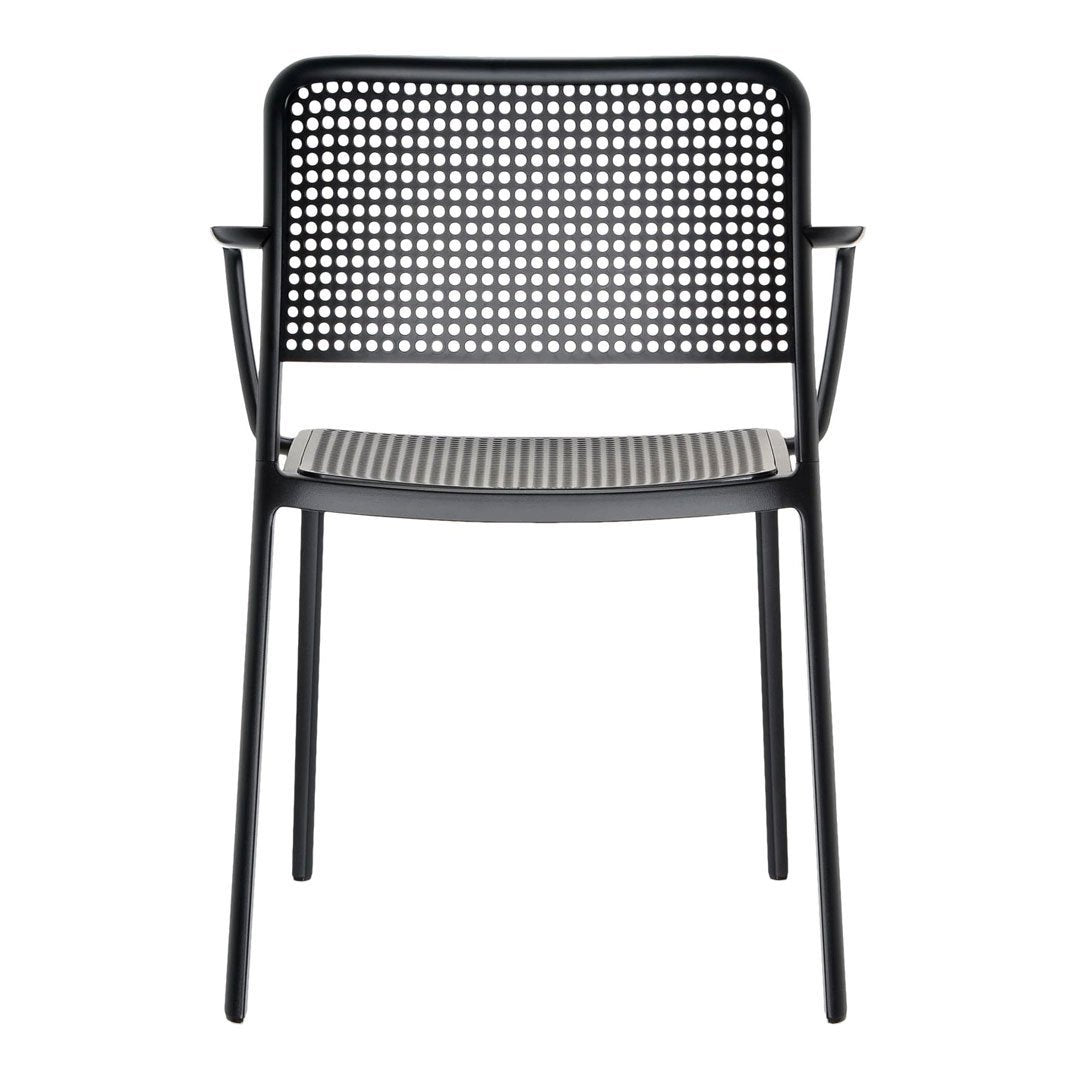 Black chair with a perforated backrest and striped seat, featuring a modern design and sleek finish.