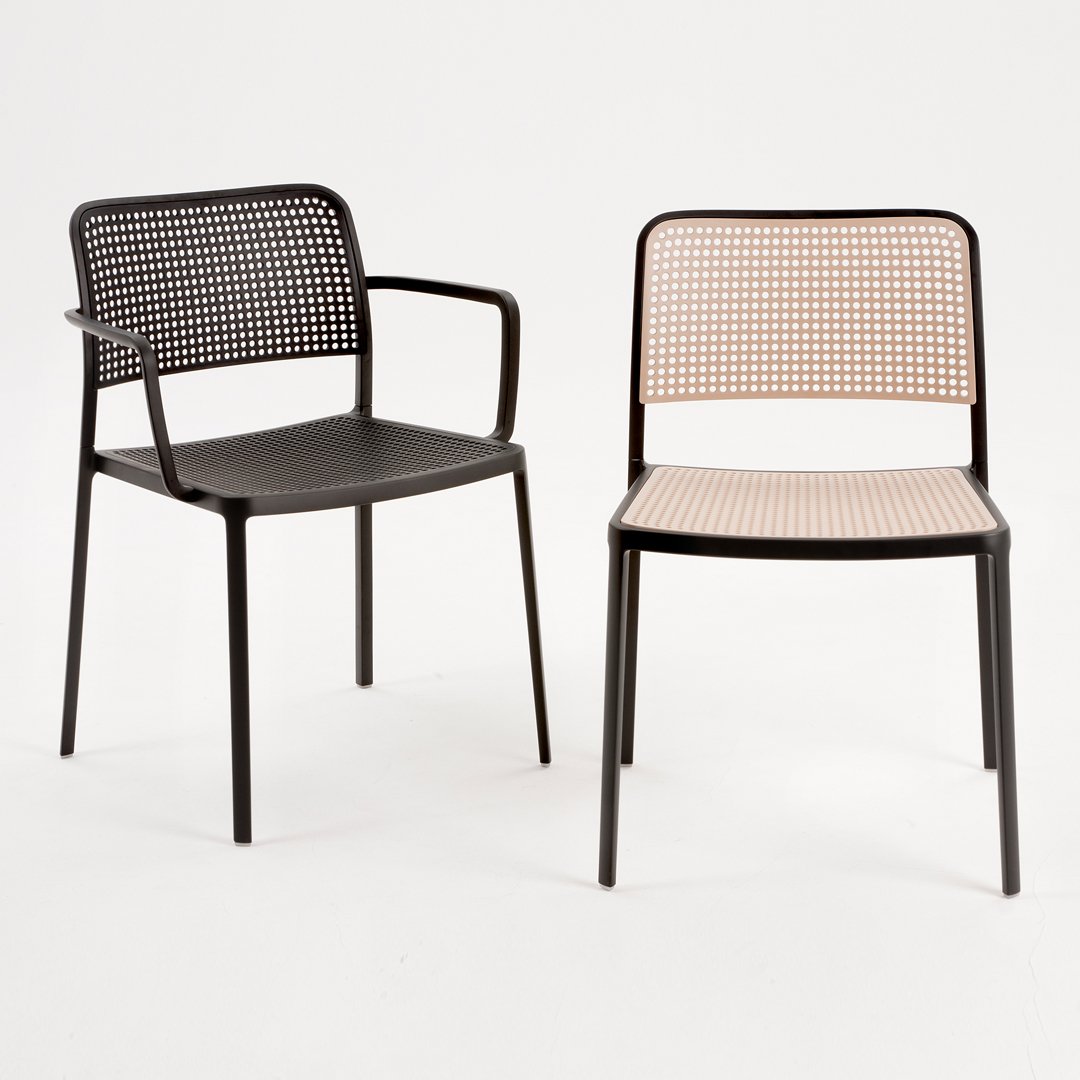 Two stylish chairs: one black with a grid-like back, and one tan with a checkered pattern. Modern and minimalist design.