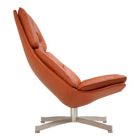 Elegant orange leather chair with a smooth texture and contemporary design, featuring a sleek silver base.