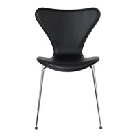 Black chair with a sleek, curved design and chrome legs, featuring a smooth, modern finish. Perfect for contemporary spaces.