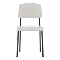 Minimalist white chair with a smooth finish and contrasting black metal legs. Perfect for modern decor.