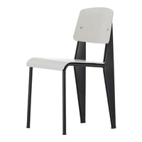 Minimalist chair featuring a gray seat and backrest with sleek black metal legs. Modern design with a smooth finish.