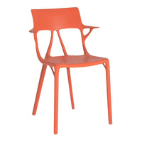 Bright orange chair with a modern design, featuring smooth lines and a minimalist aesthetic. Perfect for contemporary spaces.
