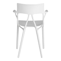 White modern chair with a sleek design and minimalistic pattern. Perfect for contemporary decor.