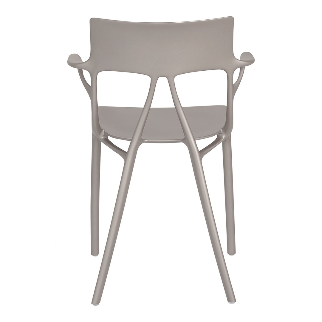 Stylish light gray chair with a modern, minimalist design and smooth, curved lines for contemporary decor.