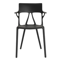 Black modern chair with a minimalist design, featuring smooth lines and a unique back pattern. Perfect for contemporary spaces.