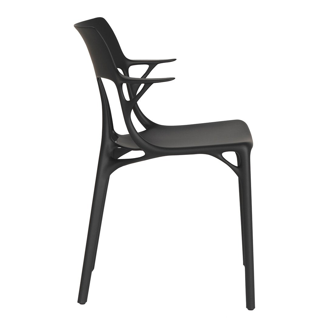 Sleek black chair with a modern design, featuring smooth lines and a minimalist silhouette. Perfect for contemporary spaces.