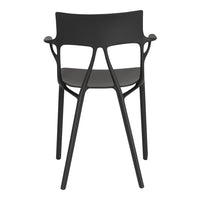 Black modern chair with a sleek design and intricate backrest pattern, perfect for contemporary spaces.
