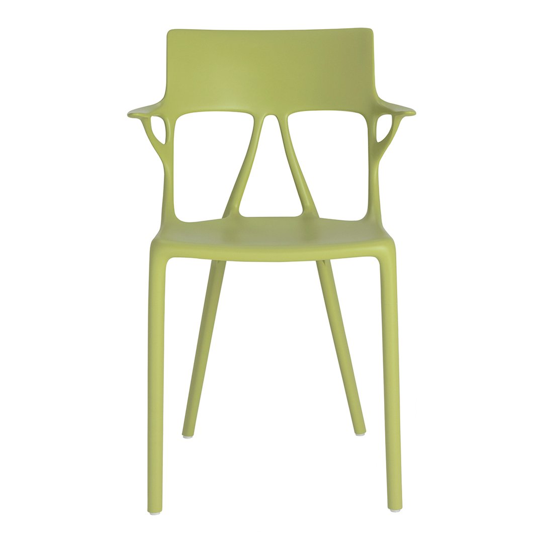Lime green ergonomic chair with modern cutout design and smooth finish, perfect for contemporary spaces.