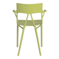 Light green chair with a modern design and unique cutout pattern. Ideal for contemporary spaces.