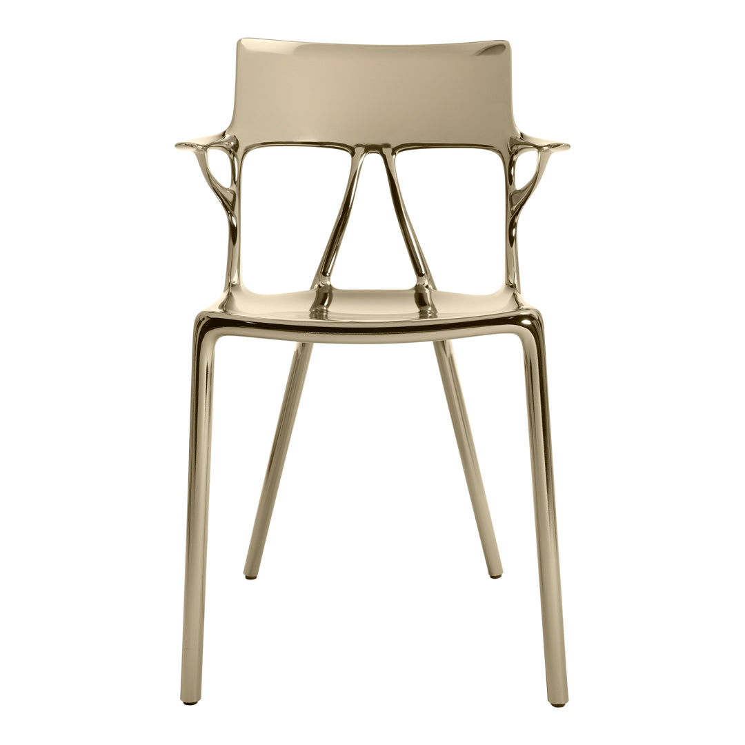 Gold modern chair with sleek lines and minimalist design, featuring a glossy finish and no visible patterns.