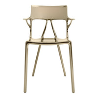 Gold modern chair with sleek lines and minimalist design, featuring a glossy finish and no visible patterns.