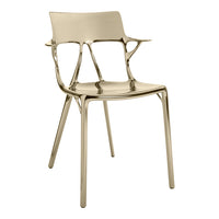 Gold metallic chair with a modern, sleek design and smooth surface, perfect for contemporary decor.