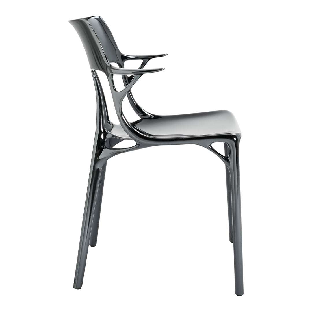 Glossy black chair with a sleek, modern design and intricate backrest pattern, perfect for contemporary spaces.