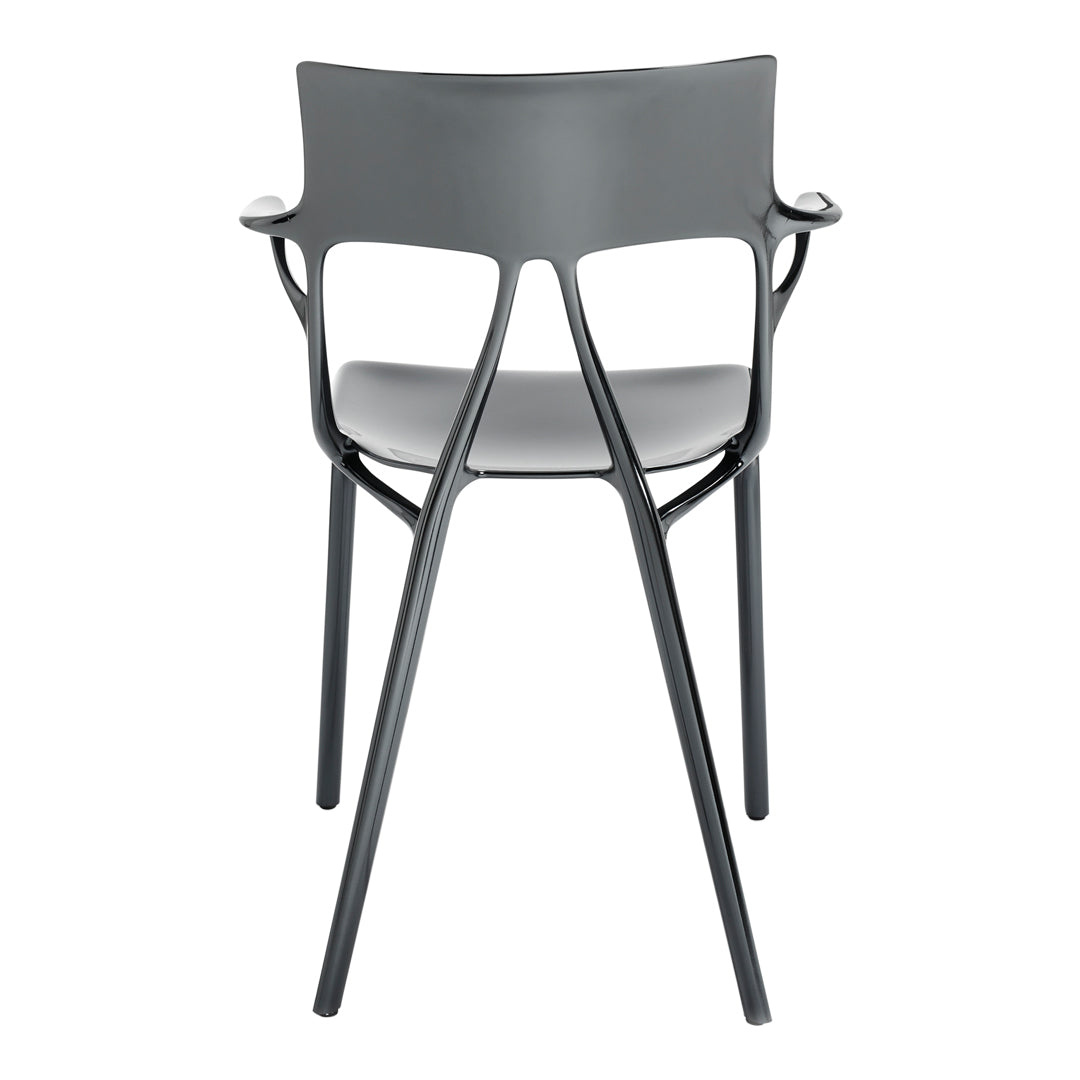 Rear view of a modern chair featuring a sleek gray finish and minimalist design. Ideal for contemporary spaces.