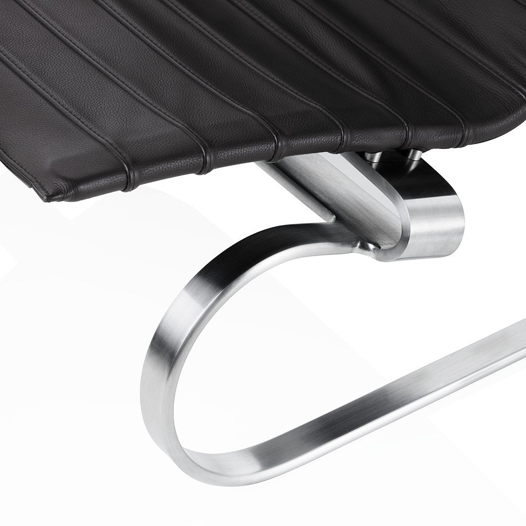 Black ribbed seat with sleek silver metal frame, featuring a minimalist design for modern interiors.